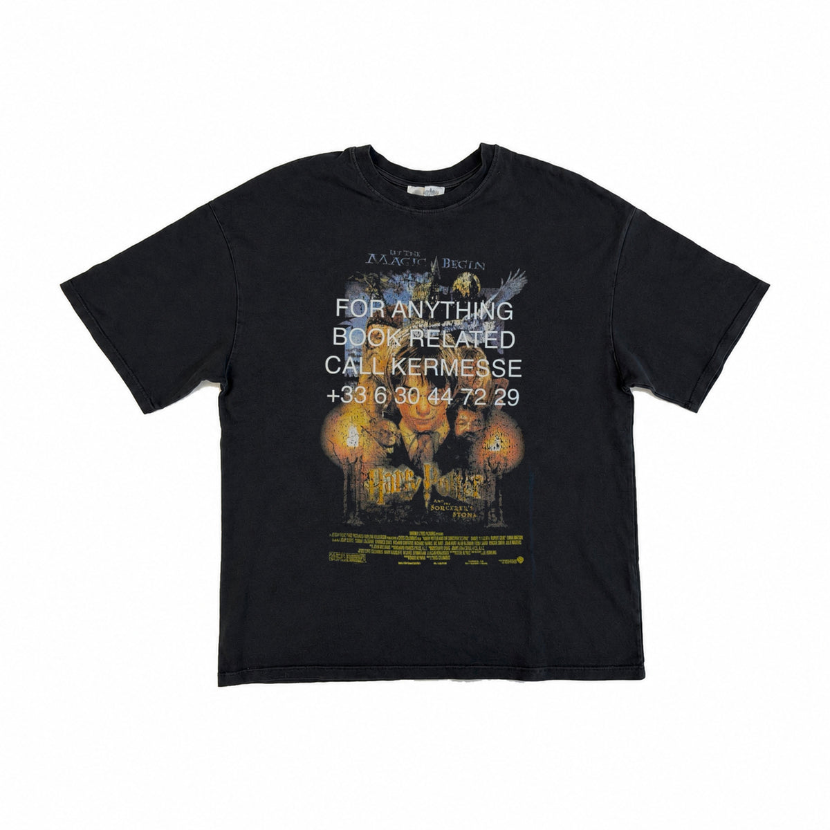KERMESSE HOTLINE faded tee #42, black short-sleeved T-shirt with Harry Potter graphic overprinted with the white KERMESSE hotline, front view on a white background.